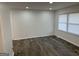 Spacious living room with luxury vinyl plank flooring and natural light at 3339 Clevemont Ct, Ellenwood, GA 30294