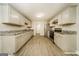 Spacious kitchen featuring stainless steel appliances, neutral cabinets and granite countertops at 1577 Keystone Dr, Conley, GA 30288