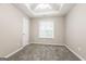 Cozy bedroom featuring carpeted floors, a ceiling fan, a window with blinds, and neutral paint at 182 Spivey Glen Dr, Jonesboro, GA 30236