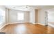 Large bedroom with natural light, ceiling fan, and doorway to additional room at 182 Spivey Glen Dr, Jonesboro, GA 30236