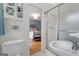 Bathroom showing tile accents and a glimpse into the Primary bedroom at 1226 Pine Knoll, Conyers, GA 30013