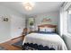 Comfortable bedroom with hardwood floors, natural light, and a closet at 1226 Pine Knoll, Conyers, GA 30013