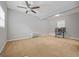 Spacious bedroom boasts natural light, a ceiling fan, and ample space for a flexible layout at 229 Lafayette St, Locust Grove, GA 30248