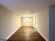 Spacious living area featuring updated flooring, neutral walls, and abundant natural light at 310 Flagstone Sw Dr, Atlanta, GA 30331