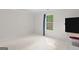 A sunlit room with a window overlooking a green yard at 3005 Ryan Rd, Locust Grove, GA 30248