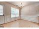 Elegant dining area with decorative wall trim, chandelier and abundant natural light offering a refined space at 737 Shadow Lake Dr, Lithonia, GA 30058