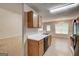Cozy eat-in kitchen with stainless steel appliances, solid surface countertops, and natural light at 737 Shadow Lake Dr, Lithonia, GA 30058
