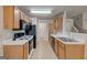 Functional kitchen featuring essential appliances and ample counter space with modern design elements at 737 Shadow Lake Dr, Lithonia, GA 30058