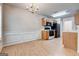 Open floorplan with dining area and kitchen, featuring essential appliances and ample counter space at 737 Shadow Lake Dr, Lithonia, GA 30058