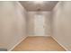 Well-lit room with hardwood floors and neutral walls at 737 Shadow Lake Dr, Lithonia, GA 30058