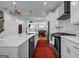 Bright and open kitchen with an island, stainless steel appliances, and modern cabinetry at 4565 Sims Park Overlook, Suwanee, GA 30024