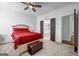 Serene main bedroom with carpet, a king bed, and an ensuite bathroom at 4565 Sims Park Overlook, Suwanee, GA 30024
