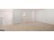 Spacious bonus room with plush carpeting and natural light at 162 Aster Ave, Locust Grove, GA 30248