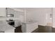 Kitchen with granite countertops, stainless appliances, and island at 162 Aster Ave, Locust Grove, GA 30248