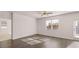 New living area features beautiful hardwood floors, recessed lighting, and bright windows at 162 Aster Ave, Locust Grove, GA 30248