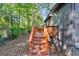 Rear deck with wooden stairs, perfect for outdoor entertaining and relaxation at 1336 Mcclelland Ave, Atlanta, GA 30344