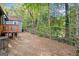 Image of the backyard featuring a chain link fence and lush green trees at 1336 Mcclelland Ave, Atlanta, GA 30344