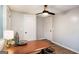 A serene bedroom provides ample natural light, complementing the ceiling fan, hardwood floors, and a work desk at 1336 Mcclelland Ave, Atlanta, GA 30344