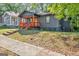 Charming home with covered porch and freshly cut lawn at 1336 Mcclelland Ave, Atlanta, GA 30344