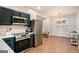 Modern kitchen featuring stainless steel appliances and an open floor plan at 1336 Mcclelland Ave, Atlanta, GA 30344