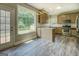 Open kitchen features modern appliances, stylish cabinetry, and ample natural light at 823 Hennepin Ter, Mcdonough, GA 30253