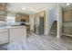 Spacious kitchen with stainless steel appliances, granite countertops, and convenient island at 823 Hennepin Ter, Mcdonough, GA 30253