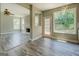 Open floorplan with seamless transition from living room with fireplace to bright eat-in kitchen at 823 Hennepin Ter, Mcdonough, GA 30253