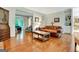 Comfortable living room featuring hardwood floors, and multiple rooms around it at 207 Tiverton Trl, Peachtree City, GA 30269