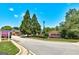 The Pinnacle Pointe community entrance featuring brick signage and landscaped greenery, giving an inviting welcome at 273 Prominent Loop, Mcdonough, GA 30253