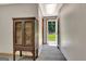 Basement access to the outside with wood door, peg board and natural light at 4950 Creel Rd, Fairburn, GA 30213