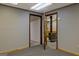 Basement with a wood burning stove and a doorway leading to another room at 4950 Creel Rd, Fairburn, GA 30213