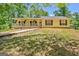 Charming house with a covered front porch, offering a cozy and welcoming curb appeal at 4950 Creel Rd, Fairburn, GA 30213