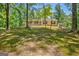 Cozy single-Gathering home surrounded by a natural, wooded landscape at 4950 Creel Rd, Fairburn, GA 30213