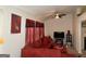 Comfortable living room with bright light and large red sectional sofa at 3505 Saddle Creek Ln, Ellenwood, GA 30294