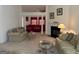 Spacious living room featuring two couches and fireplace at 3505 Saddle Creek Ln, Ellenwood, GA 30294