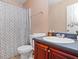 Clean bathroom featuring vanity with storage and combined shower and tub at 5865 El Segundo Way, Atlanta, GA 30349