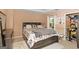 This charming bedroom features a stylish bed with built-in storage and tray ceilings at 5865 El Segundo Way, Atlanta, GA 30349