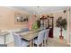 Elegant dining room featuring a decorative table, seating for six and a china cabinet at 5865 El Segundo Way, Atlanta, GA 30349