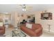 The living room features comfortable seating and a glimpse into the adjacent dining area at 5865 El Segundo Way, Atlanta, GA 30349