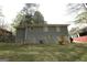 Exterior back of house with large backyard at 2364 Farley St, East Point, GA 30344