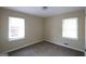 Bedroom with neutral paint and carpet at 2364 Farley St, East Point, GA 30344