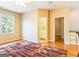 Bonus room with hardwood floors, a ceiling fan, neutral walls, and a large window providing natural light at 2810 Promenade Pl, Buford, GA 30519