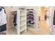 Walk-in closet with shelving and clothing racks for optimal storage in the home at 2810 Promenade Pl, Buford, GA 30519