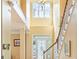 Grand entryway with a two-story foyer, staircase, and a view of the front door with glass detailing at 2810 Promenade Pl, Buford, GA 30519