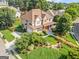 Charming two-story home featuring a landscaped front yard and covered porch at 2810 Promenade Pl, Buford, GA 30519