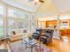 Bright living room boasting large windows, hardwood floors, and an open concept design at 2810 Promenade Pl, Buford, GA 30519