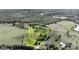 Expansive property featuring a large cleared lot surrounded by mature trees, ponds, and serene natural landscape at 68 Riveree Rd, Brooks, GA 30205