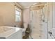 Bright bathroom featuring a glass-enclosed shower, modern vanity, and sleek fixtures at 68 Riveree Rd, Brooks, GA 30205