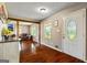 Open-concept living room featuring beautiful hardwood floors, natural light, and an inviting atmosphere at 68 Riveree Rd, Brooks, GA 30205