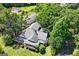 Expansive home aerial view with lush green surroundings and additional outbuilding at 441 Crumbley Rd, Mcdonough, GA 30252